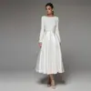 Vestido de Noite Elegante para Mulheres 2026 Inverno Novo Estilo Banquete Branco Simples Manga Longa Fotografia de Viagem Estilo Floresta Vestido Fornecimento de Fábrica