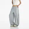 Pantalones de chándal de dos tonos con estampado de letras y estrellas estilo americano Unisex Hip Hop Pierna ancha Streetwear Estilo genial High Street Pantalones Banana