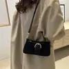 Bolso tipo baguette texturizado de alta calidad para mujer, nuevo estilo verano 2026, elegante bolso retro para hombro o axila, bolso cruzado versátil y moderno