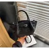 Bolso de cubo de moda súper popular transfronterizo para mujer 2026 nuevo bolso cruzado de moda bolso tote pequeño para el trabajo moderno