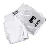 Ropa de Entrenamiento UFC para Hombre Pantalones Ajustados de Boxeo de Secado Rápido Pantalones Cortos de Muay Thai Fighting Manga Corta Pantalones de Lucha para Gimnasio