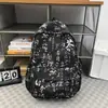 Mochila da marca Tide masculina estudante universitário nicho minimalista estilo ins mochila para estudante do ensino médio tendência da moda mochila de viagem feminina