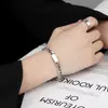 Pulsera de Acero de Titanio con Trébol de Cuatro Hojas en Todo el Diseño, Popular de Venta Caliente Transfronteriza para Niñas, Cuerda Roja, Exquisita, Lujo Ligero, Gama Alta, No se Desvanece, Joyería de Mano