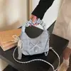 Bolso texturizado de diseño único para mujer, modelo nuevo 2026, fresco, versátil, de moda, bolso de hombro, bolso de axila, bolso cruzado