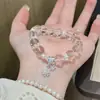 Pulsera Elegante de Cristal Blanco Natural con Forma de Copo de Nieve y Mariposa de Gama Alta para Mujer, Joyería de Nicho Exquisita Versátil con Atmósfera de Otoño e Invierno