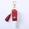 Funda de cuero sin desinfectante de manos de PU, llavero con borla para spray, botella vacía de spray de perfume desinfectante, llavero de funda de cuero
