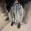 Verano 2026 Nuevo Estilo Americano Pantalones Cortos para Hombre Marca de Moda Diseño Delgado Sentido de Diseño Nicho Sueltos Tallas Grandes Vaqueros Capri