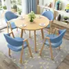 Conjunto de mesa e cadeiras para negociação loja comercial recepção reunião mesa redonda pequena área de descanso simples casual uma mesa quatro cadeiras mesa de jantar