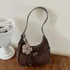 Bolso versátil de moda estilo coreano transfronterizo para el trabajo, modelo nuevo de nicho otoño 2026, bolso de mano para mujer, bolso tipo dumpling para hombro y cruzado