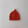 Gorro de lana cálido para bebé estilo coreano ins color liso otoño e invierno para niños y niñas simple versátil gorro para el frío