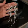 Aretes de Aguja Plateada con Borlas de Gota de Agua Incrustadas de Diamantes, Estilo Palacio, Nicho, Aretes Versátiles, Lujo Ligero, Venta al por Mayor de Aretes de Gama Alta