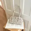 Bolso de bolos de nicho estilo coreano para mujer, nueva colección 2026, diseño de lunares, gran capacidad, bolso de hombro, adecuado para el transporte diario, bolso tipo almohada moderno y a la moda