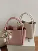 Bolsa estilosa de alta capacidade para mulheres, novo modelo de verão 2026, bolsa de ombro e transversal texturizada para o dia a dia, bolsa tipo balde da moda