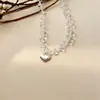 Collar con colgante de corazón de cuentas de cristal facetado blanco, cadena simple y fresca para la clavícula con corazón en tono plateado, versátil para niñas