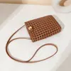 Bolso de Sardina 2025 Nuevo para Mujer Tejido Hueco Bolso Pequeño Cuadrado de Mano Bolso Cruzado con Diseño Tejido de Industria Pesada