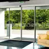 Puerta automática de vidrio con marco de platino perfil de aleación de aluminio puerta automática puerta de inducción de acero inoxidable
