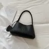 Verão 2026 Nova Textura Trançada de Alto Valor para o Dia a Dia Cor Sólida Bolsa de Ombro Único para Axila Sensação Relaxada Bolsa de Mão de Nicho Tendência
