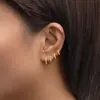 Europa y Estados Unidos transfronterizos súper ventas latón chapado en oro real pequeños exquisitos simples incrustados con circonita moda todo partido pendientes conjunto