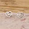 Brincos de Coração com Chave para Comércio Exterior Transfronteiriço para Mulheres Nicho Elegante Estiloso Aço Inoxidável Simples Mini Pregos de Osso da Orelha Mercadoria em Lote