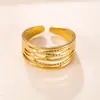 Anillo de Acero Inoxidable de Nuevo Estilo Transfronterizo con Líneas Huecas Multicapa, Moda Tendencia Fábrica de Joyería de Acero de Titanio Chapado en Oro de 18K
