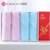 Caja de regalo de toallas Jieliya paquete de cuatro toalla facial de algodón engrosado regalo de boda compra grupal de empresa toalla de bienestar para empleados