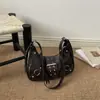 Bolso nuevo de moda 2025 con forma de media luna, versátil para ir al trabajo, bolso de hombro, bolso cruzado, estilo retro de motocicleta, bolso de moda para mujer bajo el brazo
