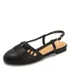 Sandalias de estilo retro para mujer, punta redonda, con borlas, para verano, suela plana, suaves, caladas, transpirables, con tira en T, zapatos de un solo color versátiles, modelo 1003-2