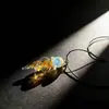 Colgante de medusa de cristal puro hecho a mano en Zibo Collar de cristal Regalo Artesanía de alta gama cultural y creativa Regalo de joyería Colgante Regalo