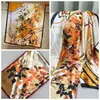 Venta al por mayor de fábrica Nuevo bufanda larga de playa satinada Li Jin 90*180 estampada estilo coreano chal de seda artificial