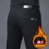 Jeans Gris Humo de Alta Gama de Hong Kong para Hombre 2026 Nuevo Ajuste Delgado Pierna Recta Elásticos Estilo Casual Pantalones Largos para Hombre