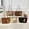 Bolso grande de mujer retro transfronterizo 2026 nueva moda versión coreana bolso tote de nicho para viajes bolso simple de axila