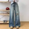 Jeans lavado rasgado estilo retrô americano para mulheres, novo para primavera/verão 2026, cintura alta, caimento solto, perna larga, comprimento total