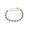 Pulseras de flor de acero de titanio con incrustaciones de diamantes, las más vendidas en Europa y América, accesorios de lujo ligero de nicho, cadenas para la clavícula, pulseras de trébol de cuatro hojas, venta al por mayor desde el fabricante