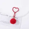 Chaveiro de coração com pompom colorido, fivela criativa de coração oco de dopamina, acessório de bolsa, enfeite de presente, pingente de miçanga