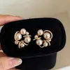 Elegante HerederaEstilo Fresco Bolso de Lunares Plateados Arete Arete Único Mujer 2026 Aretes Súper Hermosos