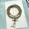 Taobao [Rao Fengchi] Pulsera de Sándalo Verde de Múltiples Círculos con Nudo de Bambú Adorno de Mano Estilo Bosque para Mujeres con Colgante de Rata Oro Púrpura