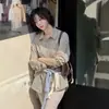 Ahora - Versión correcta: Camisa retro de rayas de estilo Dongdaemun coreano, corte holgado, manga larga y botones laterales