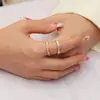 Europa y los Estados Unidos ins diseño de nicho transfronterizo sentido de alto nivel de una variedad de anillos geométricos para mujer joyería de acero de titanio chapado en oro de 18 quilates venta directa