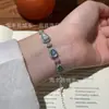 Venta al por mayor del fabricante Material natural peligroso Pulsera de calabaza de jade azul agua Plata S925 incrustada Diseño pequeño y fresco