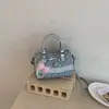 Bolso de hombro lindo estilo coreano estilo universitario, mochila pequeña nueva de verano 2026 para ir al trabajo, bolso de mano portátil de lunares de nicho
