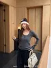 Trece FilasKAPOKOtoño/Invierno Nuevo Estilo Coreano Cuello en U Bolsillo Doble Manga Larga Capa Base Camiseta de Manga Larga 61125