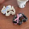 Pinza para el pelo de cachorro coreana linda de lunares con lazo Pinza de tiburón para pelo semirecogido Accesorios para el pelo versátiles de alta gama Accesorios para la cabeza