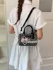 Bolsa de ombro fofa estilo coreano, estilo faculdade, nova mochila pequena de verão 2026 para o dia a dia, bolsa de mão portátil de nicho com bolinhas