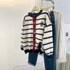 Suéter cardigan de rayas color block nuevo 2026, top de punto versátil de estilo coreano para otoño/invierno, ajuste holgado, cuello redondo
