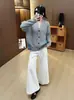 Cárdigan de punto de mezclilla patchwork estilo europeo 2026 otoño/invierno nuevo diseño casual holgado chaqueta suéter para mujer moderno