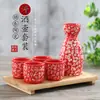 Suministro directo de fábrica botella de vino de cerámica japonesa botella de vino botella de vino botella de vino pintada a mano dispensador de vino shochu una olla de cuatro tazas