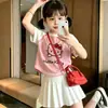 Camiseta Trendy de Manga Corta con Bloques de Color Estilo Coreano para Niños y Niñas, Top de Algodón de Verano con Cuello Redondo y Costuras Visibles para Niños Mayores