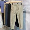 Overol estilo Hong Kong de otoño microelástico holgado recto pequeño pantalones casuales versátiles para hombre cómodos simples pantalones cortos de moda