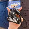 Llavero colgante creativo de cuero PU para piano, llavero de bolsa de coche de cuero para violín, regalo colgante de muñeca