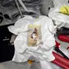 Camiseta Branca Soltinha de Algodão Puro para Mulheres, Manga Curta, Ombro Reto, Design Único, Nicho, Super Popular para o Verão 2026